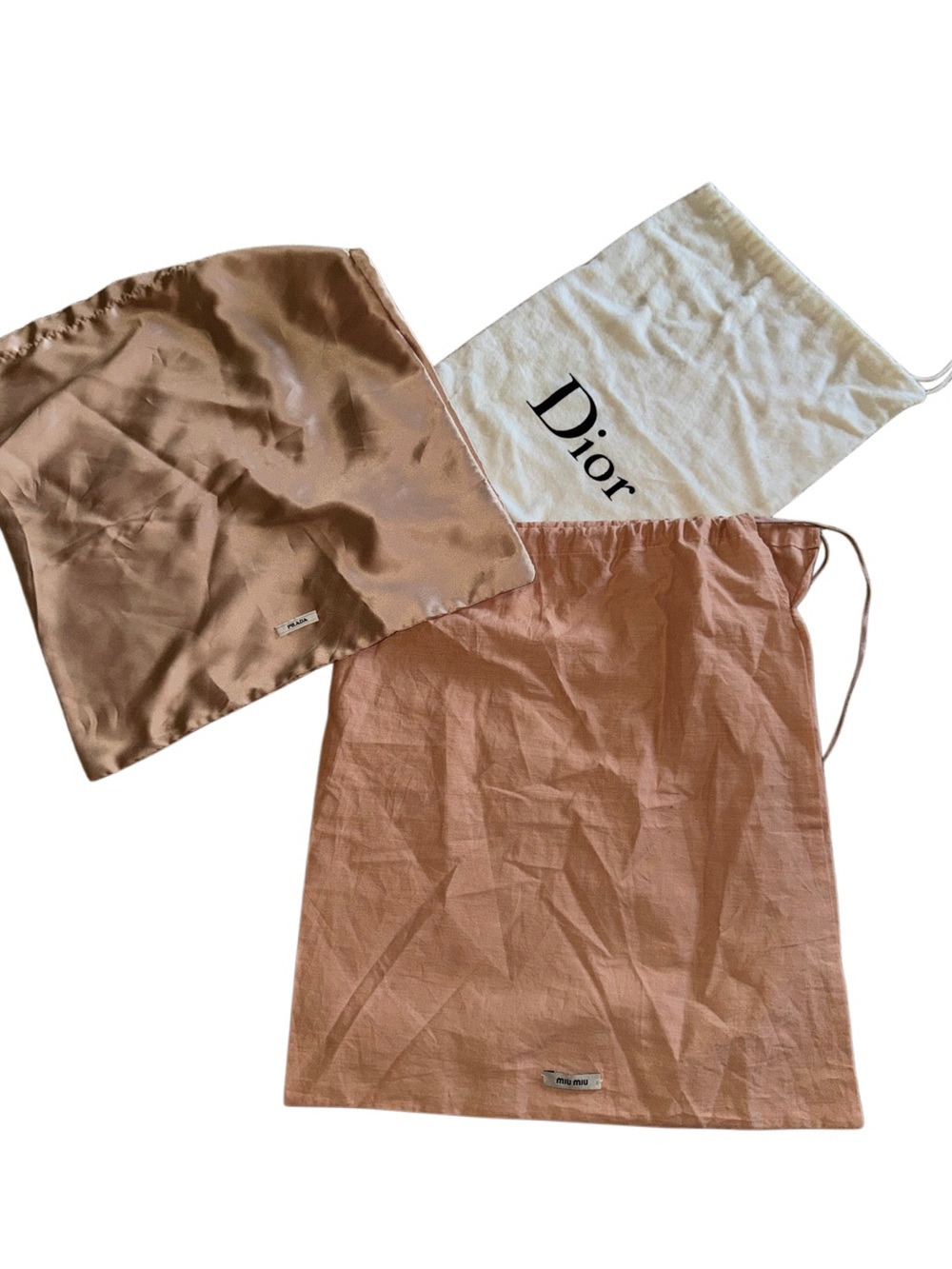 LOT OF 3: Prada Dusty Pink Silky Bag, MIU MIU cotton bag, & Dior Flannel Bag.